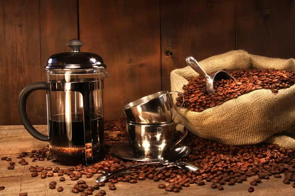French Press Coffee with beans abou to be brewed for the right length of time