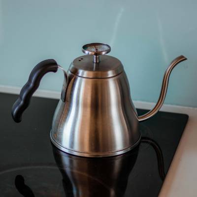 A basic gooseneck kettle with a thermometer