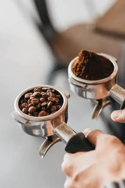 Some coffee beans in a coffee cup