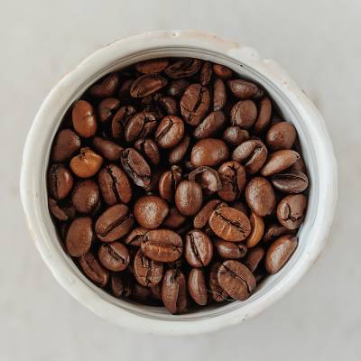 Some Coffee Beans In A Bowl