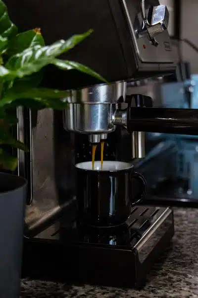 An Espresso Machine pouring an espresso shot