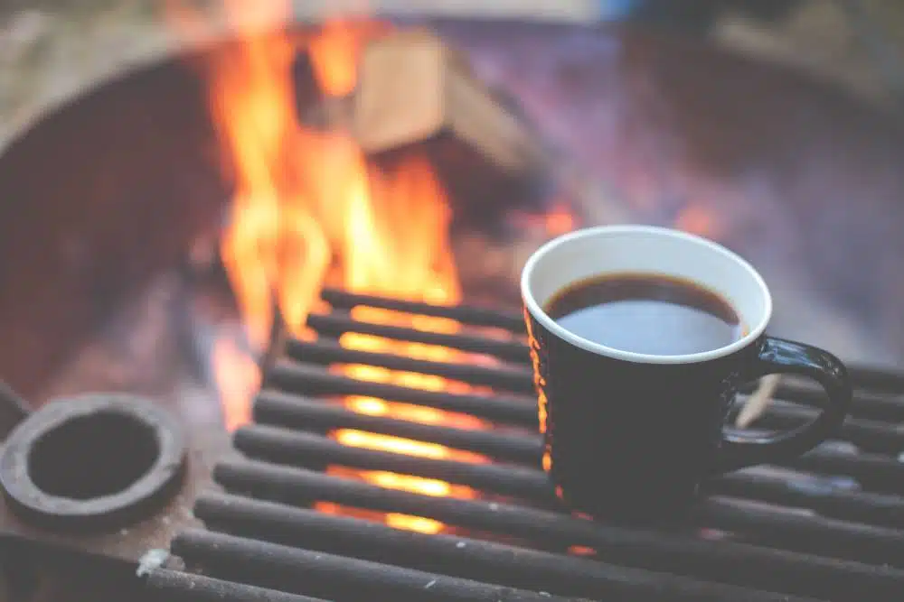 coffee by a camp fire