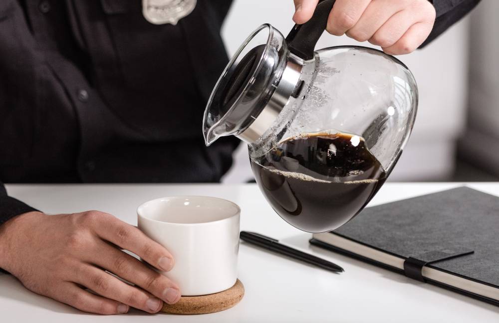 pouring a jug of drip coffee