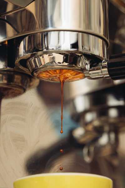 Espresso dripping from a portafilter