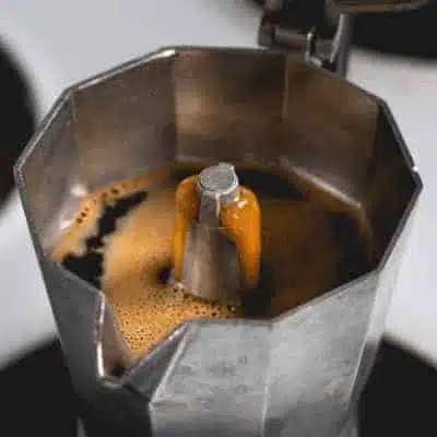 Coffee bubbling up through a Bialetti Moka Express