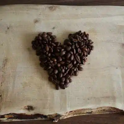 Caprissimo Italiano Coffee Beans in a love heart on wood