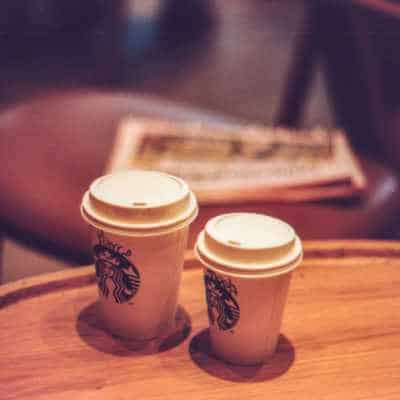 Two starbucks cups