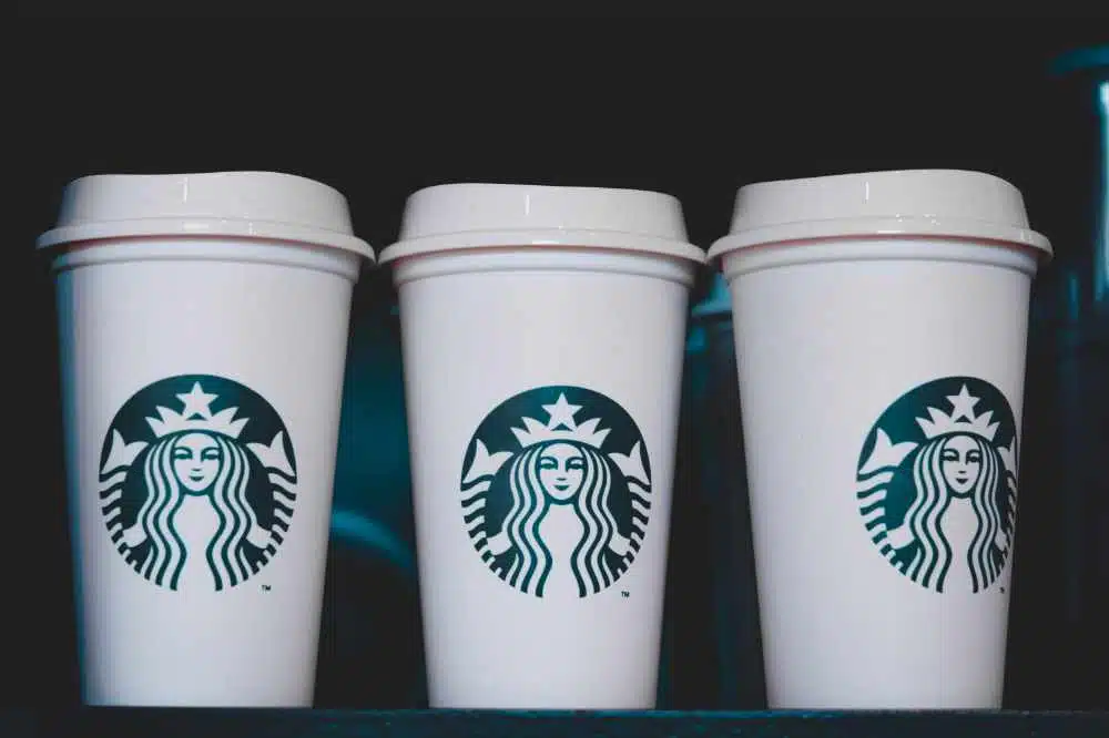 Three Starbucks Cups Lined Up