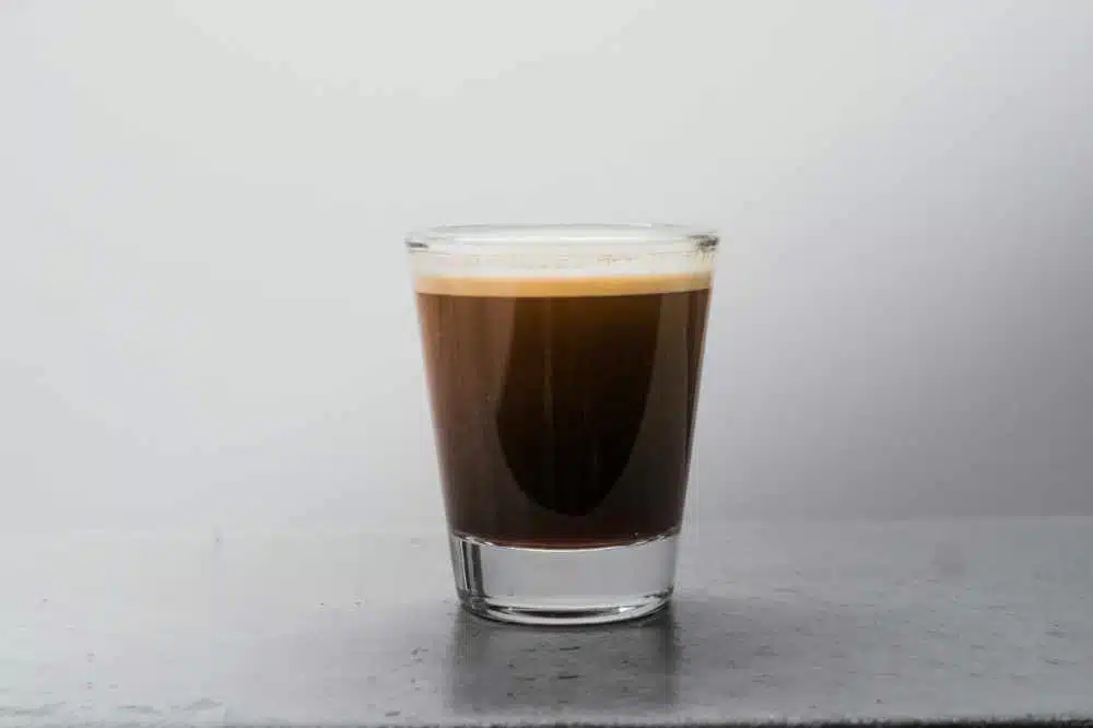 a long shot espresso in a glass